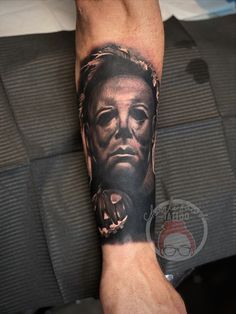 a man's arm with a portrait of abraham lincoln on it and the words abraham lincoln written in black ink