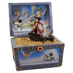 an open box with some figurines in it