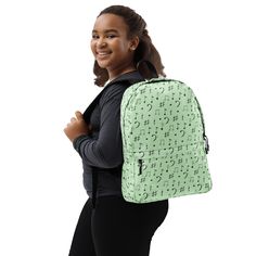 Step into style and carry your essentials in harmony with the Mint Melody All-Over Print Backpack. Designed for music enthusiasts with a love for fresh aesthetics, this backpack combines functionality and charm, making it the perfect companion for any adventure. The refreshing mint-green backdrop is playfully decorated with a pattern of musical notes, sharp symbols, and bass clefs, creating a dynamic design that’s as lively and creative as your favorite composition. Its soft, cool tones paired w Back To School Functional Backpack With Adjustable Straps, Back To School Standard Backpack With Adjustable Straps, Back To School Gym Backpack, Sporty Softback Backpack For Students, Standard Backpack With Adjustable Straps, Back To School Gym Bag, Casual Gym Backpack For School, Casual Back To School Gym Backpack, Sports Activities