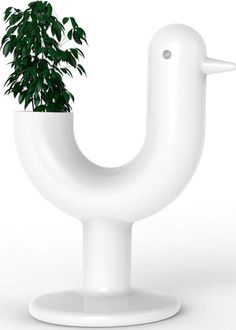 a potted plant in the shape of a bird