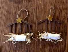 two nativity decorations made out of toilet paper and twine