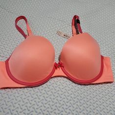 Brand New Coral In Color With Pink Outline Spring Pink Padded Bra, Pink Underwire Partially Lined Bra, Victoria's Secret Pink Bra For Spring, Pink Padded Underwire Bra, Feminine Pink Partially Lined Bra, Pink Partially Lined Feminine Bra, Stretch Pink Padded Bra, Pink Underwire Stretch Bra, Partially Lined Pink Bra For Spring