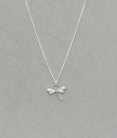 Dragonfly Necklace The dragonfly pendant is silver plated and measures 17mm x 20mm. The dragonfly is dainty, but still shows great detail It is strung on a silver plated tiny 1.3mm curb chain with a lobster clasp closure. Choose the length from the drop down. Silver Dragonfly Necklace, Dragonfly Jewelry, Urn Jewelry, Dragonfly Necklace, Dragonfly Pendant, Jewelry Essentials, Funky Jewelry, Cute Bracelets, Keep Jewelry