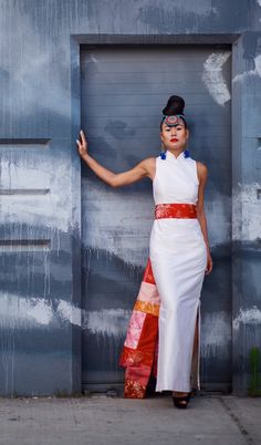 "Elegant and sophisticated long white silk shantung sleeveless Cheongsam dress with modern keyhole back detail. Featured on model with our long red patchwork sash (sold separately for $250). Shown in photos on mannequin with red brocade obi sash (sold separately for $45). -traditional mandarin collar -fitted column style with side slits (to approximately mid-thigh) -sheer organza back with keyhole opening and self-covered buttons -invisible center back zipper -white machinemade silk shantung (on Sleeveless Cheongsam, Obi Sash, Modern Cheongsam Dress, Modern Cheongsam, Qipao Cheongsam, Cheongsam Dress, Column Dress, Chinese Wedding, Guest Dress