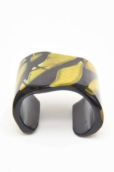 For Sale on 1stDibs - The juxtaposition of embedded chartreuse resin that looks like foil against black plexiglass becomes almost 3 dimensional. This sculptural one of a kind Unique Black Bangle Cuff Bracelet, Unique Black Cuff Bracelet, Lucite Jewelry, Plastic Jewelry, Bracelet Vintage, Cuff Bracelet, Heeled Mules, Mule Shoe, Cuff Bracelets