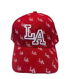 a red hat with the word la on it and letters all over it in white