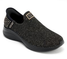 Add a touch of glamour to your everyday look with these sparkly slip-on shoes. Featuring a metallic knit upper adorned with rhinestone embellishments and a memory foam cushioned comfort insole, these shoes offer both style and comfort. The heel pillow ensures a secure fit, making them ideal for hands-free wear. From Martha Stewart x Skechers. Sparkle Shoes, Metallic Knit, Rhinestone Embellishments, Martha Stewart, Hands Free, Everyday Look, Slip On Shoes, Memory Foam, Fashion Shoes