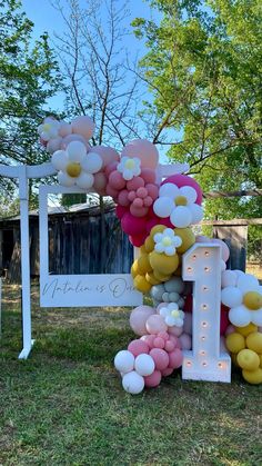 balloons are arranged in the shape of letters and numbers