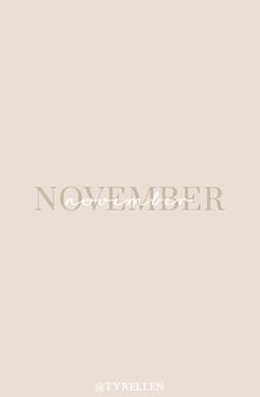 the word november written in white on a beige background