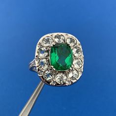 * Clyde Duneier CID Sterling Silver Green Tourmaline White Amethyst Cocktail Ring * Ring Size: 10 * Top of ring measures: 1" x 7/8" * Height: 1/2" * Emerald Cut Green Tourmaline total carat weight: approximately 3.5 tcw * Round White Amethyst total carat weight: approximately 3.0 tcw * Weight: 7.2 tgw * Condition: Great * S3297    Exported By ExportYourStore :) Oval Tsavorite Multi-stone Ring, Oval Multi-stone Tsavorite Rings, Collectible May Birthstone Gemstone Rings, Collectible Gemstone Rings For May Birthstone, Victorian Emerald Gemstone Ring, Amethyst Cocktail Ring, Green Tourmaline, Cocktail Ring, Cocktail Rings