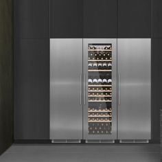 the wine cooler is open and ready to be filled with bottles or glasses for tasting