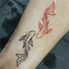 a tattoo on the arm of a person with a goldfish in it's hand