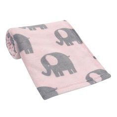 a pink and grey elephant print blanket on a white background