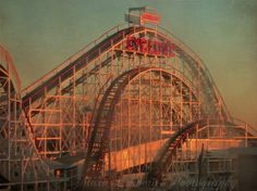 the cyclone roller coaster at six flags amusement park is shown in this undated photograph