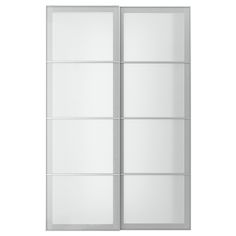 a white sliding door with glass panels on the bottom and bottom part, in front of a