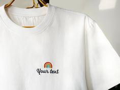 We offer a high quality custom embroidery service where you can embroider your favorite text and graphics on the t-shirt to make it your unique garment. Our t-shirts are made of 100% cotton, loose and comfortable, breathable and perfect for everyday wear. You can choose your favorite color from the color options we offer and have your text and graphics embroidered on the t-shirt. This would be a unique gift for yourself or your loved ones and family~. The embroidery technique we use is machine e White Embroidered Crew Neck T-shirt, Cotton Tops With Multicolor Embroidery And Logo, White T-shirt With Machine Embroidery, Short Sleeve, Customizable White Top With Custom Embroidery, Multicolor Embroidered Text Crew Neck T-shirt, Multicolor Embroidered Cotton Crew Neck T-shirt, Casual T-shirt With Multicolor Letter Embroidery, Casual Multicolor Embroidered Letter T-shirt, White Crew Neck Tops With Machine Embroidery