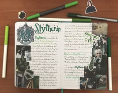 an open harry potter book with green markers and pencils next to it on a wooden table