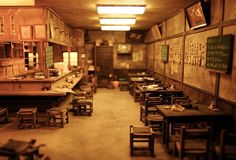 an old school cafeteria with tables and chairs