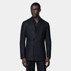 This navy herringbone suit features a tailored double-breasted jacket with a natural shoulder. The accompanying wide-leg trousers feature a subtle taper, a single pleat, and belt loops. Herringbone Suit, Italian Suit, Linen Suits, Navy Suit, Wool Flannel, Silk Linen, Peak Lapel, Double Breasted Jacket, 3 Piece Suits