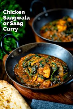 chicken saagwaala or saag curry in a skillet on a wooden table