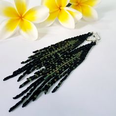 Black matt and silver color earrings. Native America beaded tassel earrings. Fringe Ombre earrings. Long earrings. Seed bead earrings. Color gradient .Waterfall earrings. Seed Beads earrings.Long dangle earrings. Beautiful,Sparkling, Elegant, Earrings .A beautiful Christmas gift for women and girlfriend. These are long but not heavy earrings. Length of earrings 14cm (4.5inches). Width of earrings 0.78 inches. To create these earrings we used seed beads of 2 shades. Materials; Luxurious Japanese Elegant Black Tassel Earrings With Round Beads, Black Beaded Fringe Dangle Tassel Earrings, Black Beaded Fringe Tassel Dangle Earrings, Black Beaded Tassel Earrings With Round Beads, Black Beaded Fringe Tassel Drop Earrings, Black Beaded Fringe Tassel Earrings As Gift, Elegant Black Beaded Fringe Earrings, Black Beaded Earrings With Tassels, Black Fringe Earrings With Round Beads