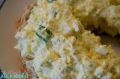 an egg salad is on a plate ready to be eaten