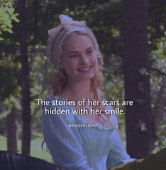 a woman in blue dress sitting on top of a horse with the caption, the stories of her scars are hidden with her smile