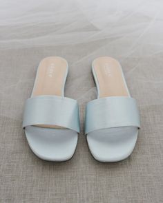 Classic slide flat sandals for casual and dressy look. Simple and easy wear for brides, bridesmaids and wedding parties.DETAILS:COLORS AVAILABLE: Ivory, Light Blue, White, Pink, and ChampagneUPPER: Synthetic upper and liningMATERIALS: Mandmade outsole STYLE NAME: EVELYN Bride Flat Sandals, Quinceanera Shoes, Bridesmaid Sandals, Shoes For Brides, Flat Sandals Wedding, Bridesmaids Shoes, Low Block Heel Sandal, Navy Blue Shoes, Pearl Sandals