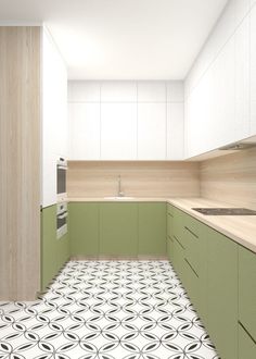 an empty kitchen with green cabinets and white floor tiles on the walls, along with a sink and dishwasher