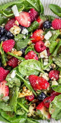 spinach salad with strawberries, blueberries and walnuts