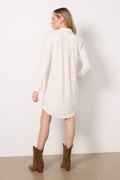 The super-soft Legend Sweater Dress from Faherty is an easy pick for any occasion, featuring a relaxed fit, front button closure, and classic shirt collar. Pair with a belt and your favorite flats for a cozy yet put-together look. | FAHERTY Women's Legend Sweater Dress, Size XS, White