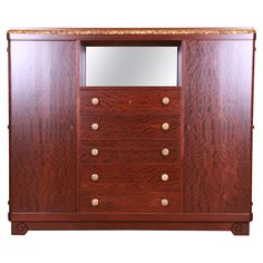 a wooden dresser with drawers and mirror on it's top shelf, against a white background