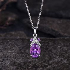 Item description ✦ Handmade, high-quality item! ✦ Material: 925 sterling silver, Solid 14K/18K GOLD (can be made in white/rose/yellow gold), Platinum ✦ Center Stone: 7x9mm Oval Cut Natural Amethyst ✦ Side Stones: Round Cut Natural Amethyst ✦ Chain length can be adjusted between 16 inches and 18 inches As it is handmade, it needs 2-4 weeks to finish and then be shipped by USPS or FedEx. Return policy: We offer 30 days return policy. For any reason, if you are not completely satisfied with your order, you may return it for a refund.  Buyer is responsible for the handcraft fee (15%-30% of the total price) and the return shipping cost. Elegant Purple Oval Pendant Necklace, Purple Gemstone Necklace With Oval Pendant, Silver Amethyst Oval Pendant Jewelry, Silver Amethyst Oval Pendant Necklace, Amethyst Oval Multi-stone Necklace, Engagement Necklace, Engagement Necklaces, Leaf Nature, Necklace Unique