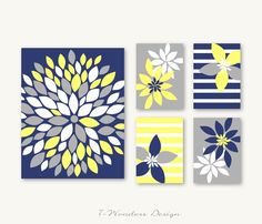 four square paintings with yellow and gray flowers on them, one is blue and the other has