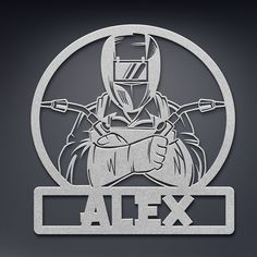 a metal sign that says alex with an image of a man holding a wrench