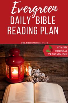 an open bible next to a lit candle and christmas decorations on a wooden table with text overlay that reads evergreen daily bible reading plan