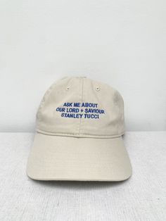 A classic Dad hat embroidered with 'Ask me about our lord and savior Stanley Tucci' in cobalt blue. The high quality and 100% organic cotton of this hat makes it a sustainable choice.  PLEASE NOTE: Orders delivered to the US will have 'savior' spelling. Orders delivered to Australia will have 'saviour' spelling (unless otherwise requested).  * 100% organic cotton * Fabric weight: 8 oz/yd² (271 g/m²) * 3/1 twill * Unstructured * 6 panel * Matching sewn eyelets * Self-fabric adjustable closure wit Stanley Tucci, Cool Car Drawings, Lord And Savior, Our Lord, Organic Cotton Fabric, Cool Hats, Girl With Hat, Dad Hat, Hat Making