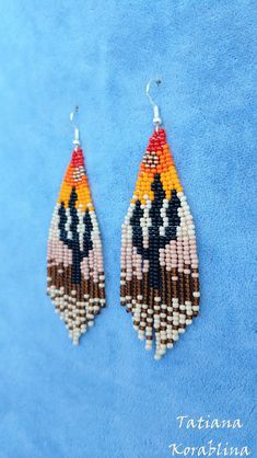 These handmade earrings are made of high-quality Czech beads and strong synthetic thread.In these unique earrings I use my author's scheme . Someone will see on the earrings of sun, sky, cactus, desert, canyon . They are elegant, fashionable, and highly versatile, suitable for everyday wear. Color: orange,red,braun,beige,black, gold (7 colores) Copy without my permission is prohibited I will make for you in the right and favorite color 100% hand made with love! Measurements: Length with hook -9. Handwoven Dangle Beaded Earrings, Unique Handwoven Dangle Beaded Earrings, Unique Handwoven Beaded Dangle Earrings, Handwoven Chandelier Dangle Earrings As Gift, Handmade Unique Long Drop Beaded Earrings, Unique Long Drop Beaded Earrings, Handmade Long Drop Chandelier Earrings, Summer Beaded Long Drop Earrings, Handwoven Round Bead Earrings For Summer