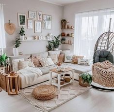 a living room filled with lots of furniture and decor