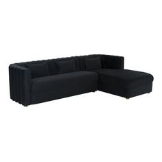 a large black couch sitting on top of a white floor