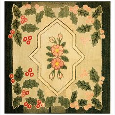 an old rug with flowers and leaves on it