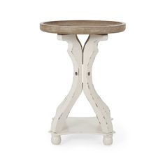 a small white table with a wooden top