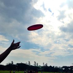 a man throwing a frisbee in the air