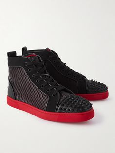 Christian Louboutin was first asked to make men's shoes for pop star Mika to wear on tour, growing up with three sisters, the singer had never seen such excitement as when they put on the designer's shoes. These 'Lou' high-top sneakers are made from panels of supple black leather, mesh and canvas. They're finished with signature spikes at the toes and have comfortable red soles. Louboutin Collection, Christian Louboutin Shoes Sneakers, Studded Sneakers, Three Sisters, Leather High Tops, Red Sole, Latest Sneakers, Studded Leather, Black Sneakers