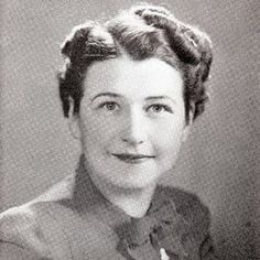 an old black and white photo of a woman