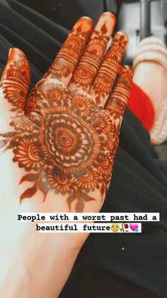 a woman's hand with henna on it and the words people with a work past had a beautiful future