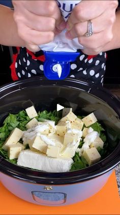 This crockpot dip changed my life! | This crockpot dip changed my life!

Kyra makes a spinach dip in a slow cooker perfect for game day. | By Kyras Kitchen | That was just ten ounces of
baby spinach that I diced up and washed. Some Philadelphia
cream cheese. That's an 8 ounce container. I can get that out
of there. Then we have another Philadelphia. Another eight
ounce. Right into our crockpot. We have some pepper jack
cheese. This is eight ounces of Pepper Jack right in there. Ooh
this is going to be good. They came cubed up. Another 8
ounces. Yep. Did you know you could get your cheese cubed up
like this? Bet you didn't. Daisy sour cream. I'm going to
do a nice squirt. About half a cup. And I'm just going to
eyeball that. I'm probably going to put a lot more than it
calls for because I l Spinch Dip, Crockpot Party, Crockpot Dip, Crockpot Party Food, Crockpot Spinach, Recipes With Velveeta Cheese, Hot Chicken Salads, Daisy Sour Cream, Chicken Salads