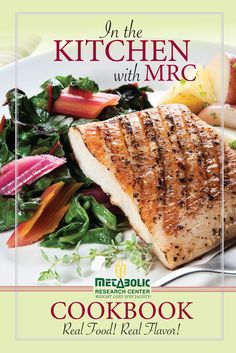 the cookbook on the kitchen with mrc includes grilled fish, vegetables and fruit