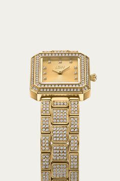 Infinitely classic in nature, Arc invites you to question the concept of time as you know it. The unisex watch features a jewel-like 23 MM X 25 MM rectangular case with a crystal-embellished bezel and 12 genuine diamonds marking each hour on the sunray finish face. Framed with an individual three-link bracelet veiled in 752 crystals, the Arc Single is an iconic piece for everyday wear. Diamond Jewelry With Rectangular Dial For Evening, Rectangular Diamond Watch With Diamond Hour Markers For Evening, Evening Diamond Jewelry With Rectangular Dial, Luxury Rectangular Diamond Watch For Evening, Timeless Rectangular Diamond Watch For Evening, Modern Watch With Diamond Accents And Rectangular Dial, Modern Diamond Watch With Rectangular Dial And Diamond Accents, Yellow Gold Rectangular Diamond Watch For Evening, Modern Diamond Watch With Rectangular Dial For Evening