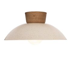 an overhead light fixture with a wooden dome on the top and white speckled paint